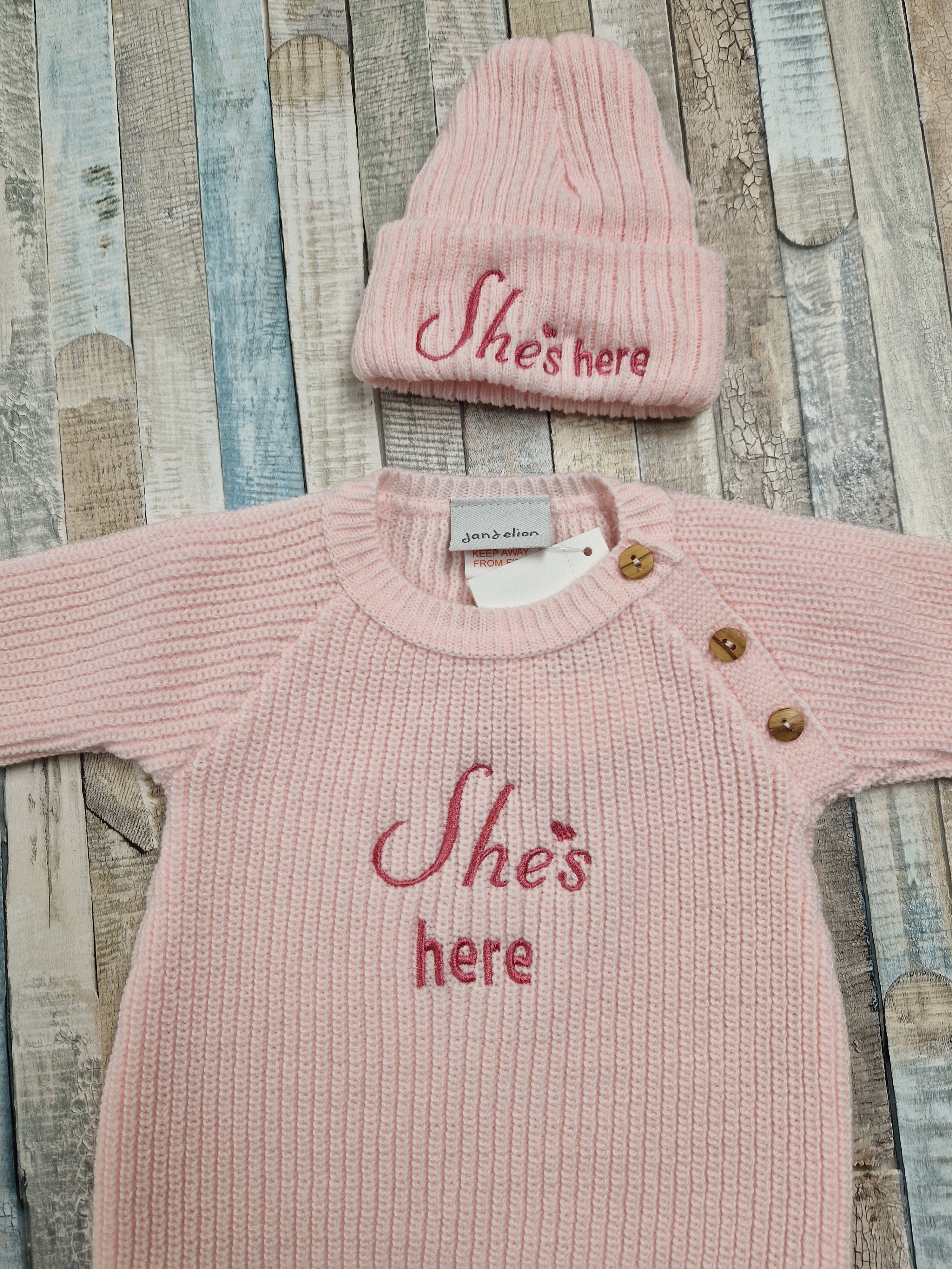 Baby Girls She's Here Long Sleeved Knitted Romper And Beanie
