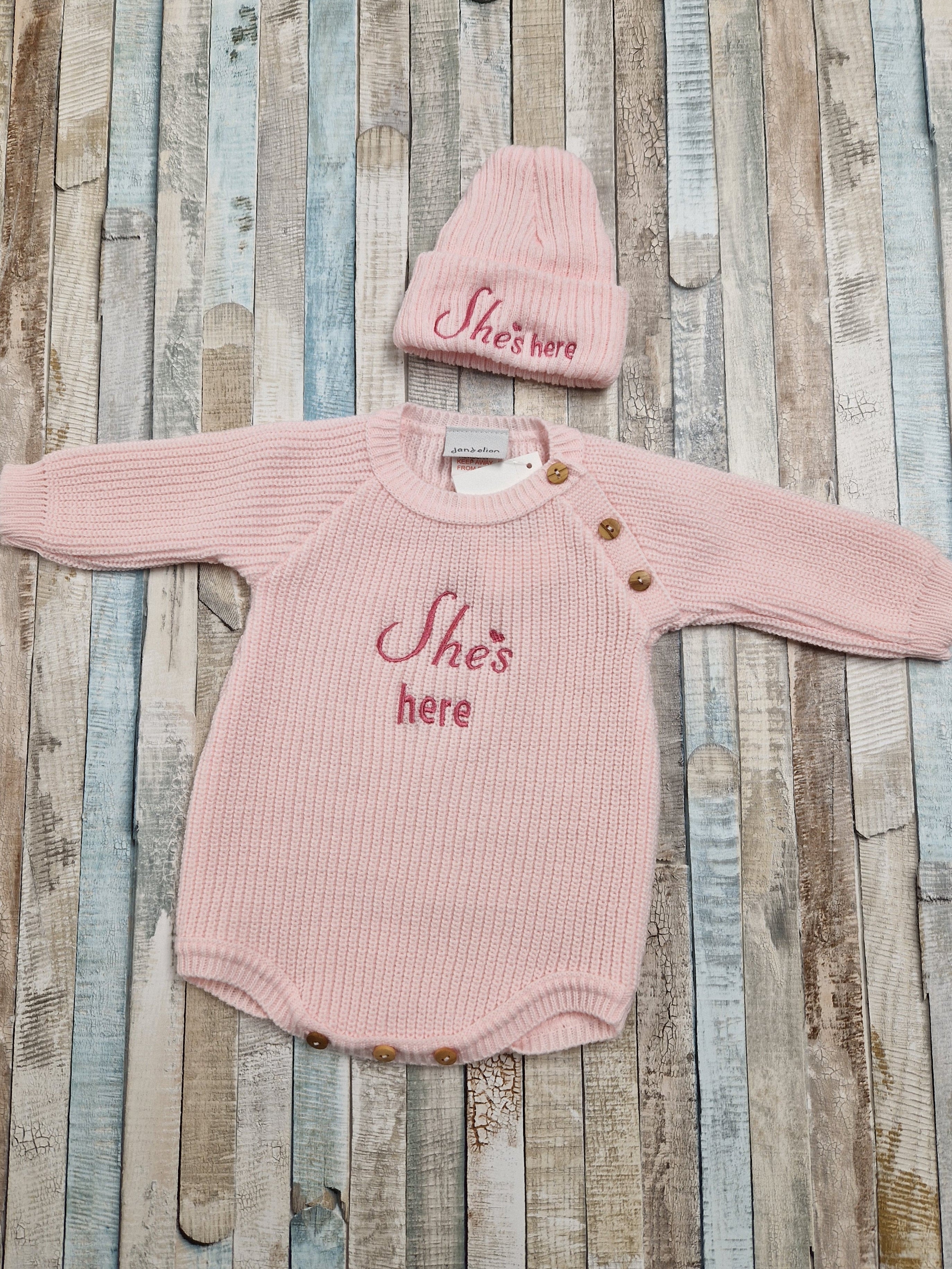Baby Girls She's Here Long Sleeved Knitted Romper And Beanie