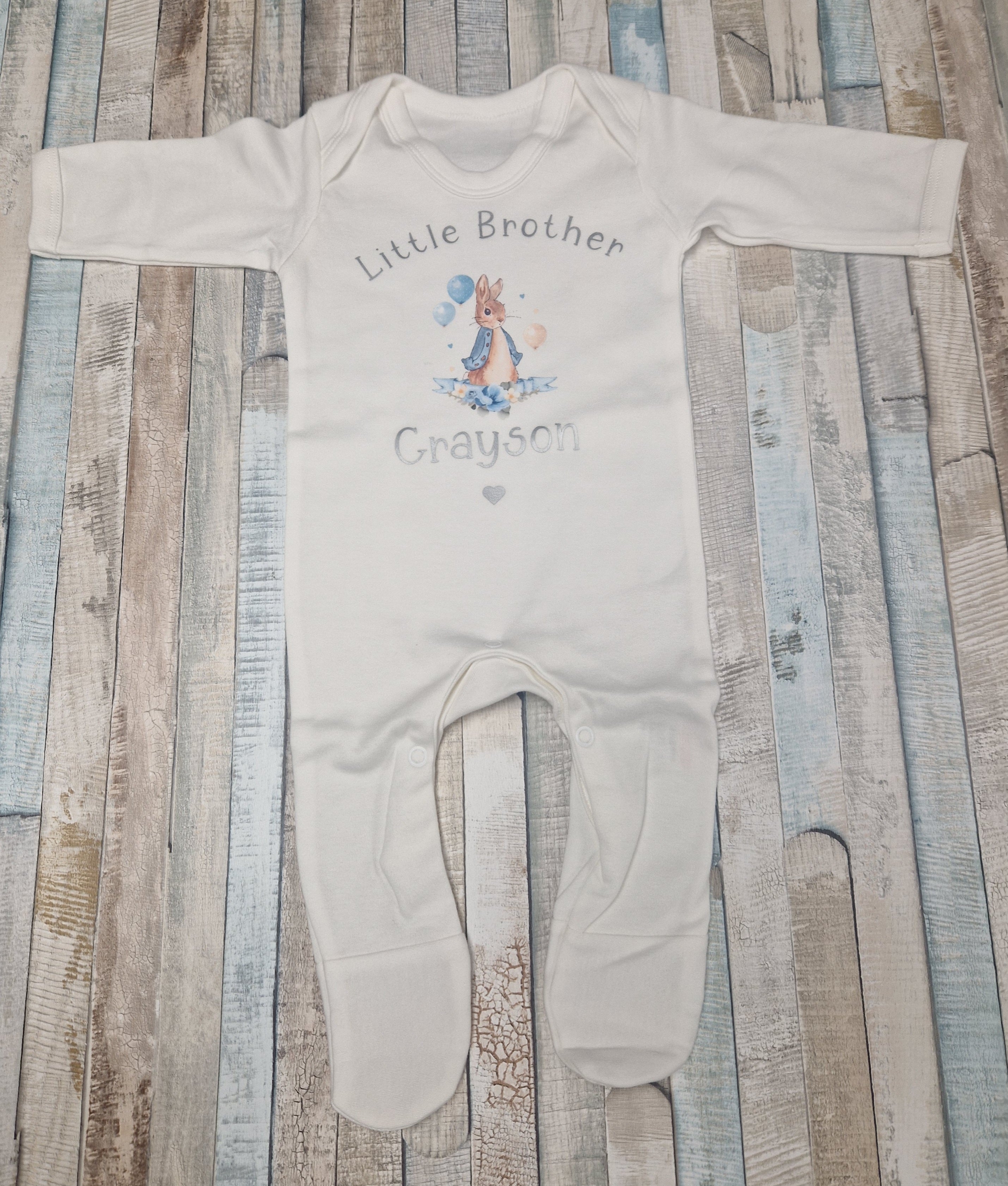 Personalised White Babygro With Printed Blue Rabbit Initial And Name