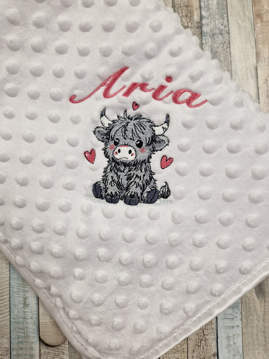Baby Girls Personalised White Dimple Wrap With Grey Highland Cow
